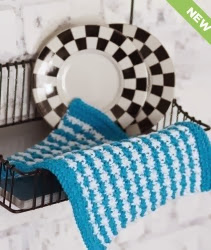 http://www.yarnspirations.com/pattern/knitting/striped-star-stitch-dishcloth