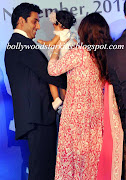 While Abhishek Bachchan Carried Daughter Aaradhya, the Baby Started Crying . (aishwarya rai hands over daughter aradhya to abhishek bachchan)