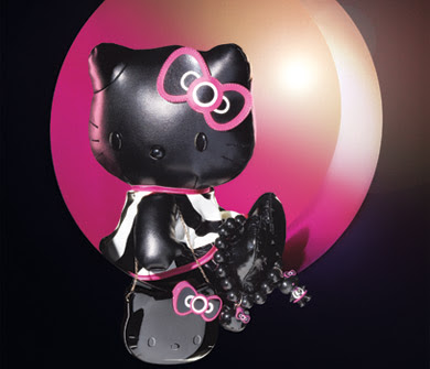 Soft black pleather 14" Hello Kitty doll in a 60&squot;s style black & white dress 