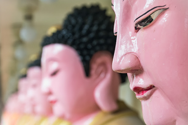 A row of Buddha statues at Kek Lok Si Temple, Penang