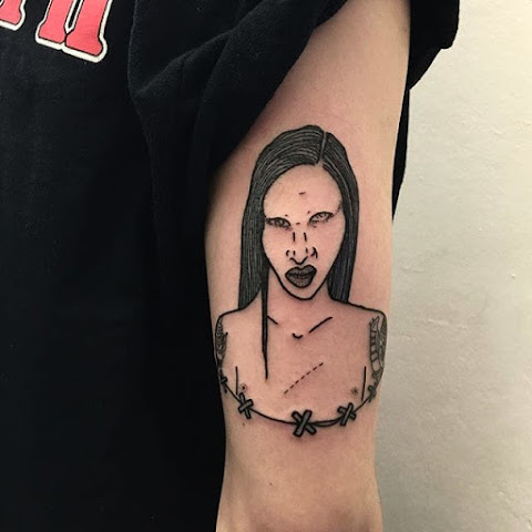 Grim and Unholy Marilyn Manson Tattoos