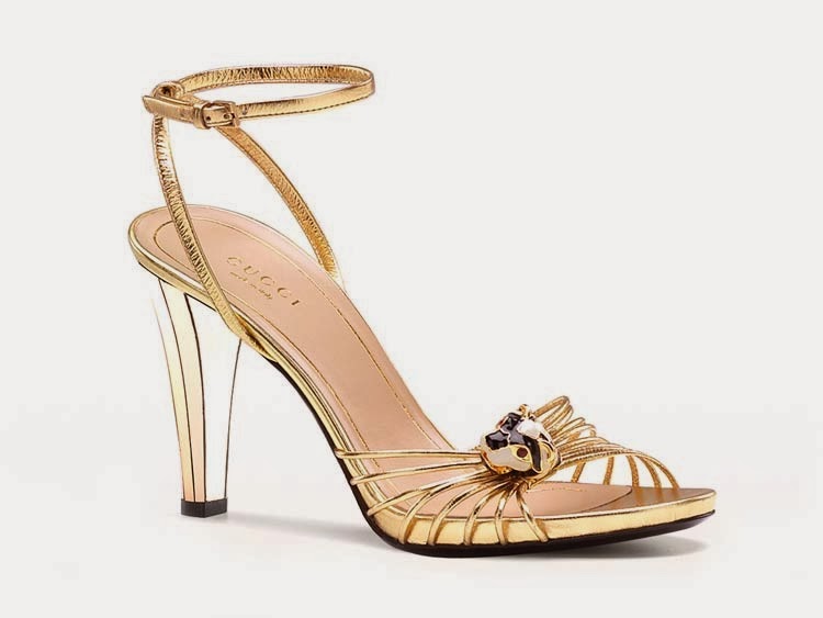 Gucci women's sandals in gold Leather