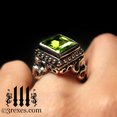 silver raven love gothic wedding ring with green peridot