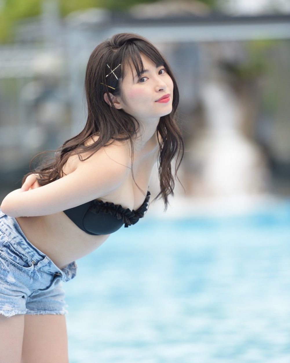 Nozomi Sato sexy Japanese gravure idol in cute black bikini top