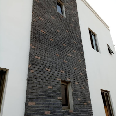 Antique bricks in black and beige colors