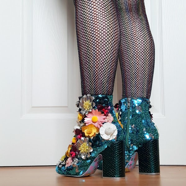 wearing block heeled ankle boots in green metallic with flowers and sequins