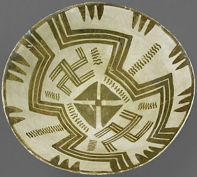 Ceramic bowl from Susa, Iran. A cross shape in the center flanked by two swastikas.