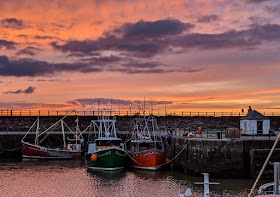 Photo of Maryport Harbour at sunset