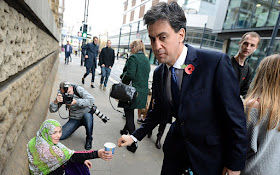 Miliband and beggar