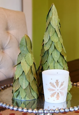 http://www.makeit-loveit.com/2012/12/simple-christmas-decor-burlap-table-runner-bay-leaf-trees.html