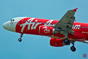 Air Asia's A320216 9MAHZ. [Taken with Sony SLTA77V, 105280@280mm . (air asia ahz lowres)