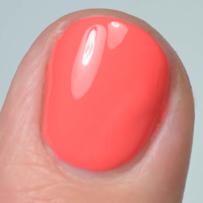 orange nail polish close up swatch