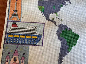 Cruise ship cross stitch on a travel themed cross stitch map