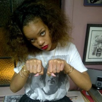 So I'm sure that by now you've seen images of Rihanna's Thug Life tattoo