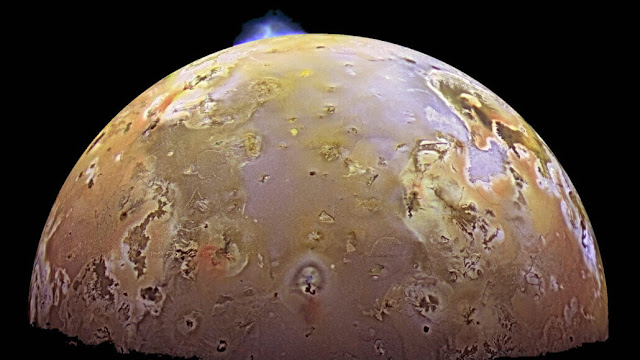 A volcanic eruption (blue) can be seen on Jupiter's moon Io, the solar system's most volcanically active body. NASA's Galileo mission, which ended in 2003, captured this image.  DLR, JPL-CALTECH/NASA