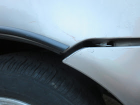 Gaps on the side of the car are bigger than at the front bumper and the bumper is pushed forward.