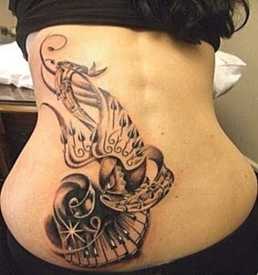 may 0209: lower back tattoo 2011