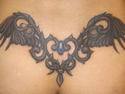 Tribal Wings Tattoo On chest Posted by new you tattoo at 1052 PM