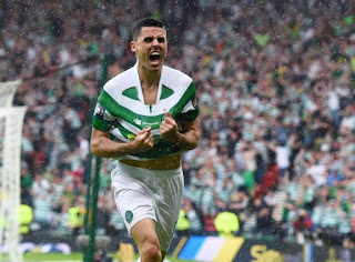 Tom Rogic celebrating in the rain after scoring the winner against Aberdeen in the Scottish Cup Final in 2017