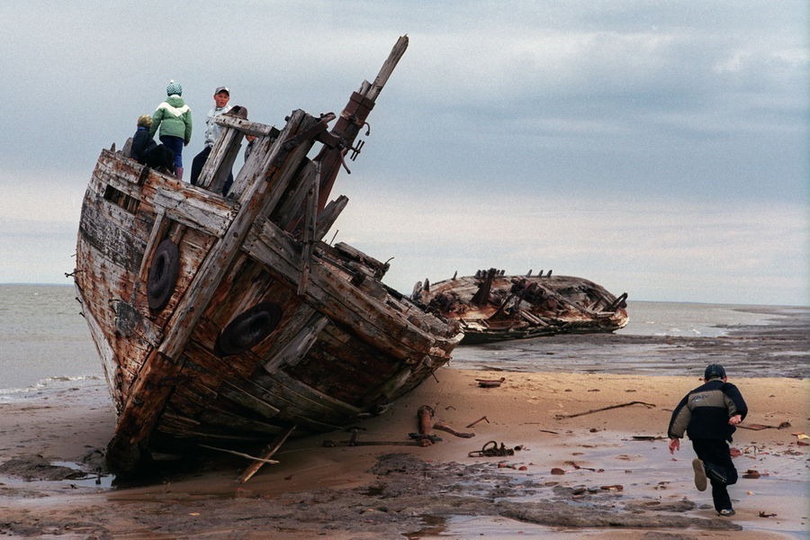 Remains of the fishing fleet once totaling more then 70 the ships now are only a place for children's games Aug. 2005 Remains of the fishing fleet once totaling more then 70 the ships now are only a place for children's games Aug. 2005