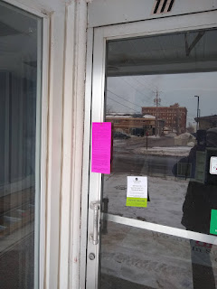 various shutoff notices on door