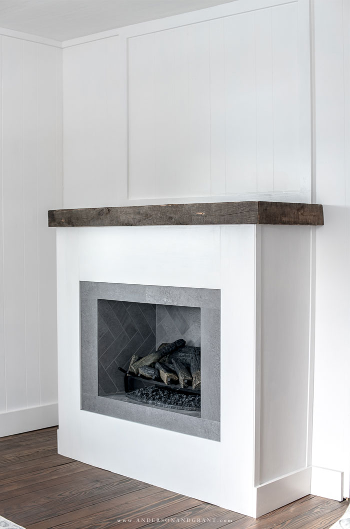 White fireplace with stone tiled firebox
