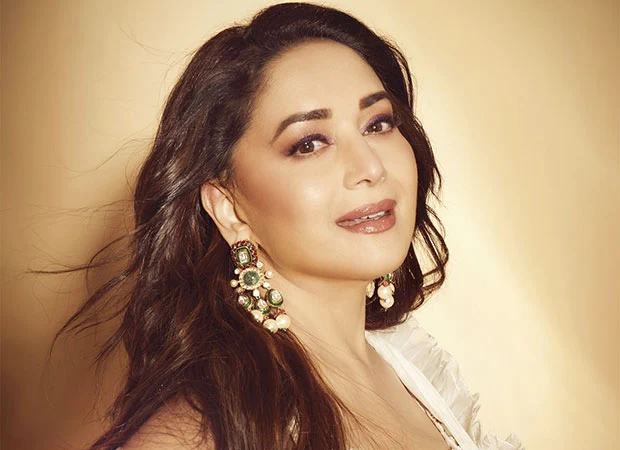 "Madhuri Dixit: Bollywood's Trailblazing Queen Who Outshined Heroes and Broke Norms"