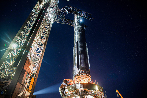 Starship Super Heavy's Booster 9 is about to be placed atop the Orbital Launch Mount at Starbase in Texas...on July 20, 2023.