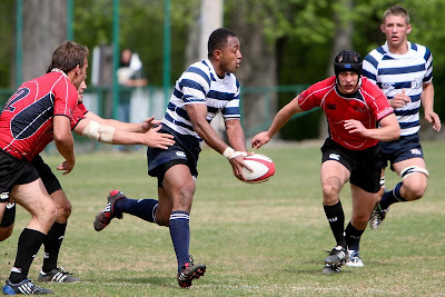 BYU Flanker Apenisa Malani and Lock Kyle Sumsion in action against Arkansas State