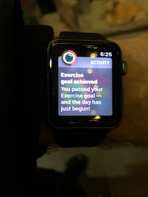 Apple Watch saying: "Exercie Goal Achieved --You pssed your exercise goal--and the day has just begun!