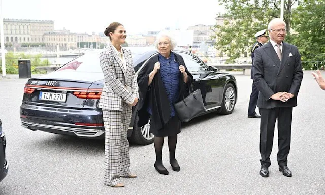 King Carl XVI Gustaf and Princess Christina. Crown Princess Victoria wore a Karah grey checkered blazer from By Malina