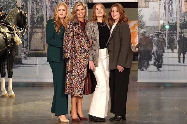 Oscar de la Renta coat, Zara green suit, Roberto Collina skirt, Zeus + Dione shirt. Queen Maxima Princesses Amalia, Alexia and Ariane