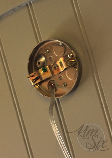 Pancake box to retrofit wall sconce