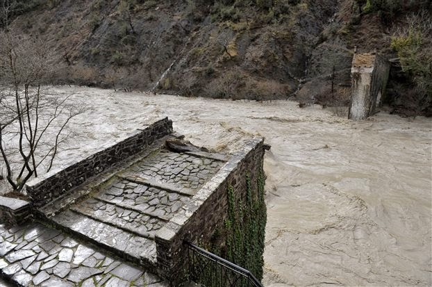 Historic Greek bridge washed out by flood waters