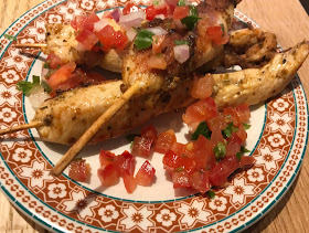 three bbq chicken skewers with salsa tapas started revolution de cuba 