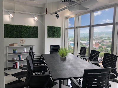 Table with chairs by the window