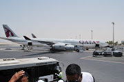 We flew from India early in the morning to Doha on Qatar Airways. (dsc )