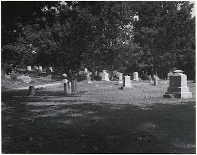 Black and white photo of cemetery