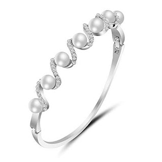 https://www.amazon.in/gp/search/ref=as_li_qf_sp_sr_il_tl?ie=UTF8&tag=fashion066e-21&keywords=Pearl Bangles&index=aps&camp=3638&creative=24630&linkCode=xm2&linkId=36220247e21ade04d71ed2d1d95c146a