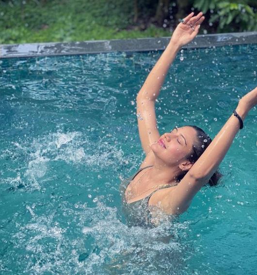 Naagin 5 star Surbhi Chandna gets the temperature soaring as she turns into a water baby