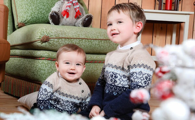 Princess Stephanie wore a beige Pea jacket pullover by Eric Bompard. Charles and Francois wore a sweater by Tartine et Chocolat