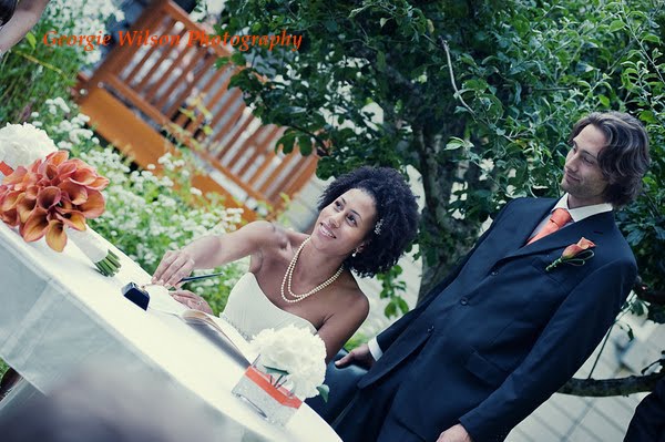 got married in a fabulous backyard wedding Table centerpieces of white