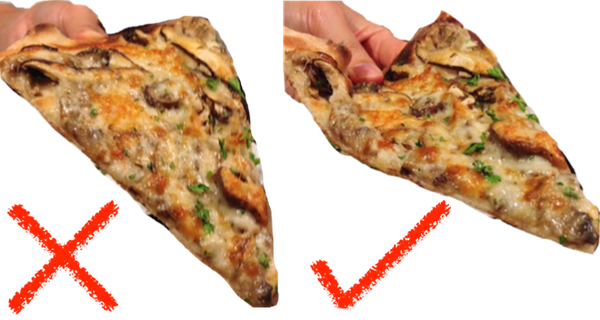 21 Daily Things You’ve Been Doing Incorrectly All Your Life & How To Do Them Right - A pizza should always be held by folding it a little to make a U-shape so as to prevent it from flopping over.