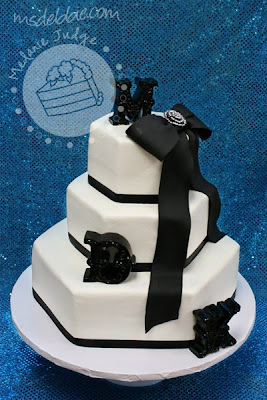 black bow buttercream wedding cake gecko