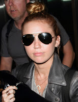 Miley Cyrus with Round Sunglasses