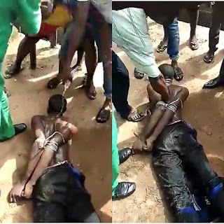 Photos/Video: Another man beaten and tied up in Abia State after he was caught wearing a shirt he allegedly stole