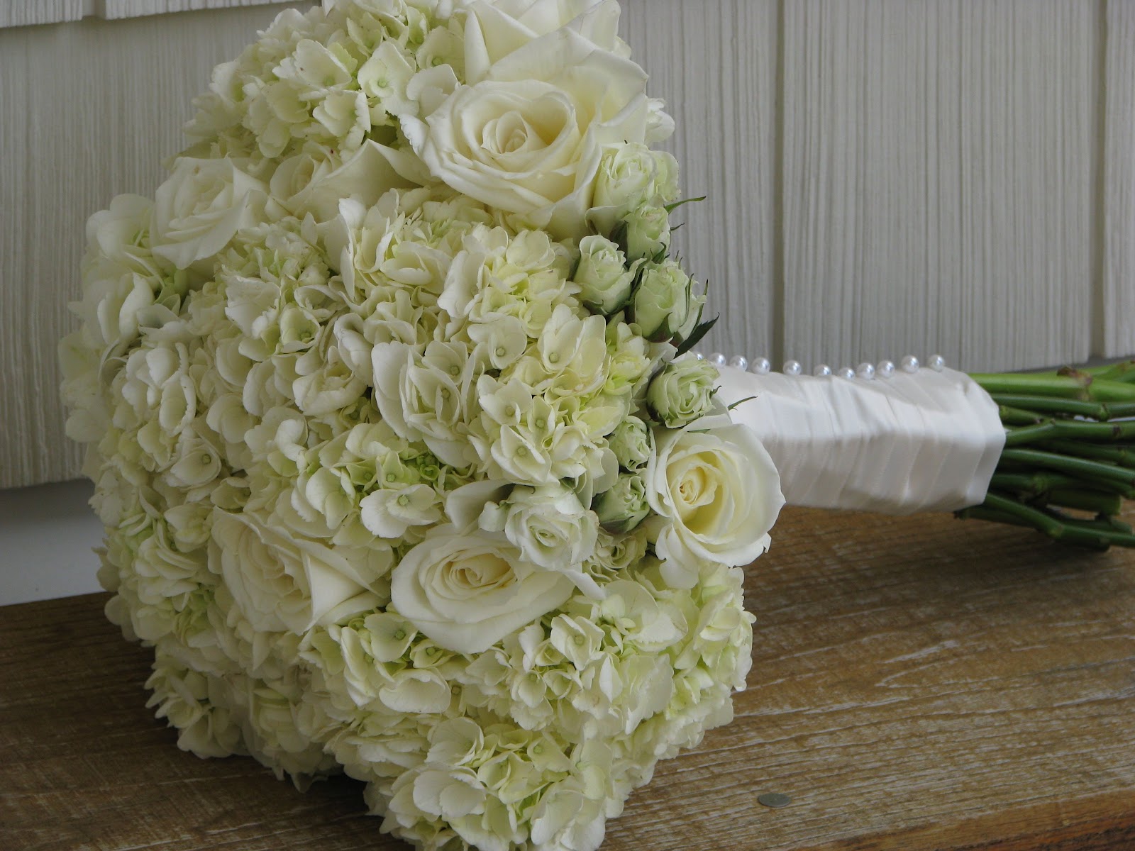  Elegant! It had white hydrangea, white roses and white spray roses