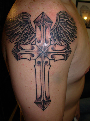 irish cross tattoos. Cross Tattoo with wings design