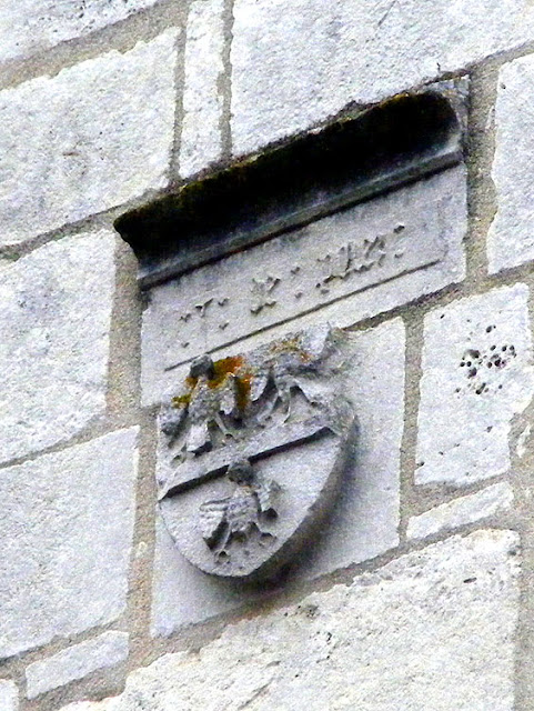 Coat of arms above church door, Concremiers, Indre, France. Photo by Loire Valley Time Travel.