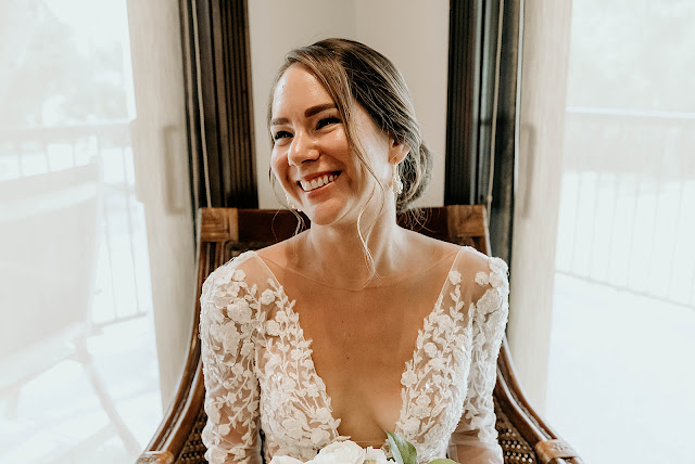 Bride smiling in seat The Manor on St Lucie Crescent Wedding captured by Stuart Wedding Photographer Heather Houghton Photography